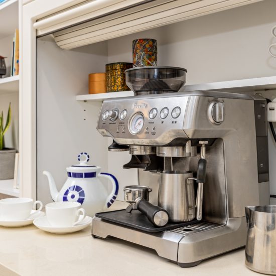 Add coffee maker to make the guests more comfortable